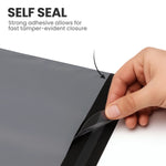 Hand peeling the adhesive strip of a grey self-seal mailing bag showing its strong tamper-evident closure.