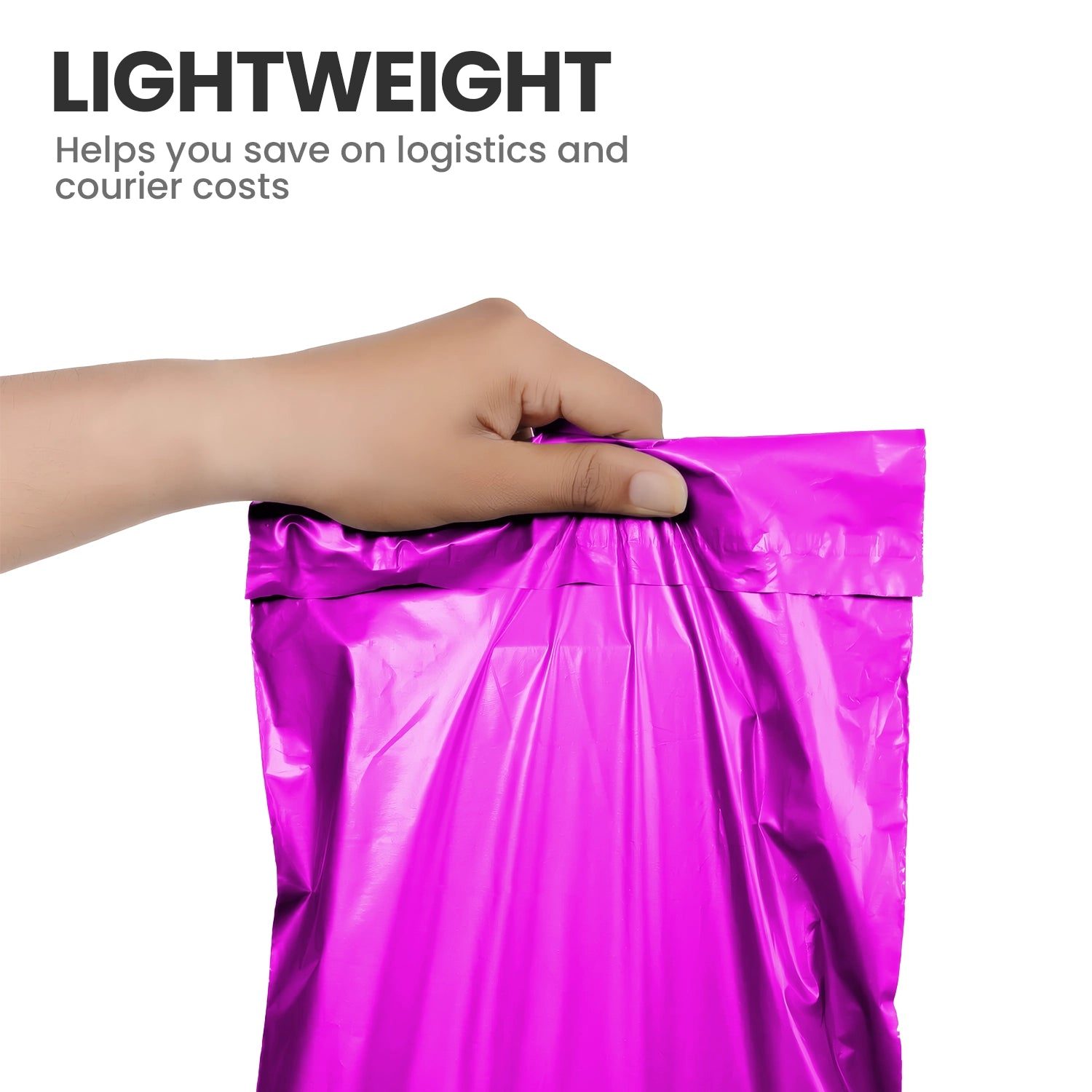 Hand holding a pink lightweight self-seal mailing bag used for postage and courier packaging.